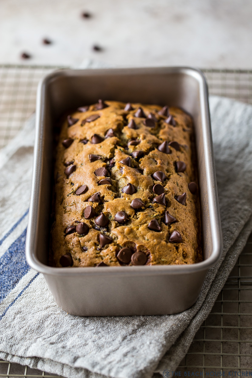 A chocolate chip zucchini bread in a loaf pan