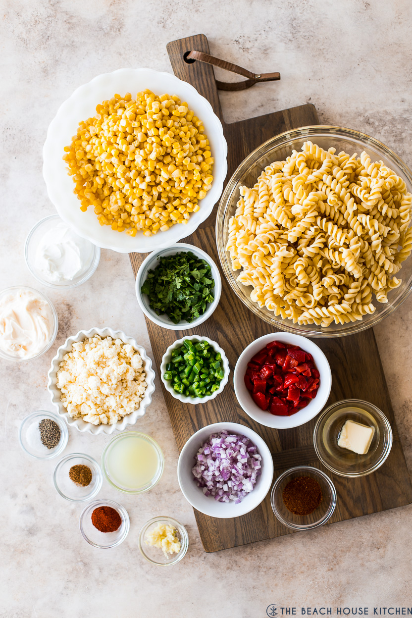 Overhead photo of ingredients for a pasta salad with corn