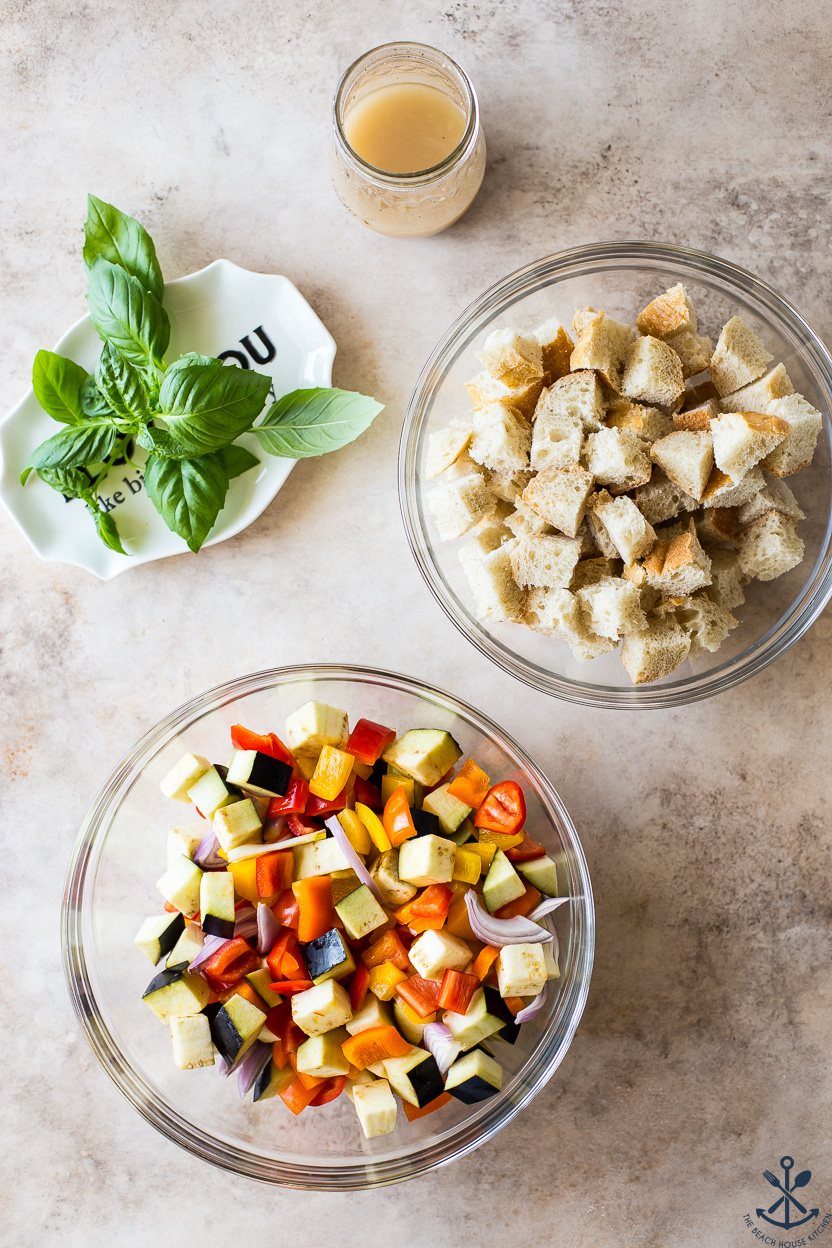 Overhead photo of ingredients for a Sheet Pan Roasted Vegetable Panzanella