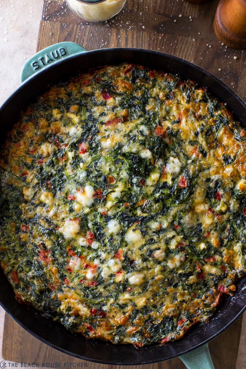 Up close overhead photo of Cheesy Greek Spinach Egg Bake