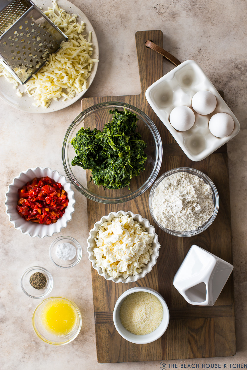 Overhead photo of ingredients for a cheesy Greek spinach egg bake