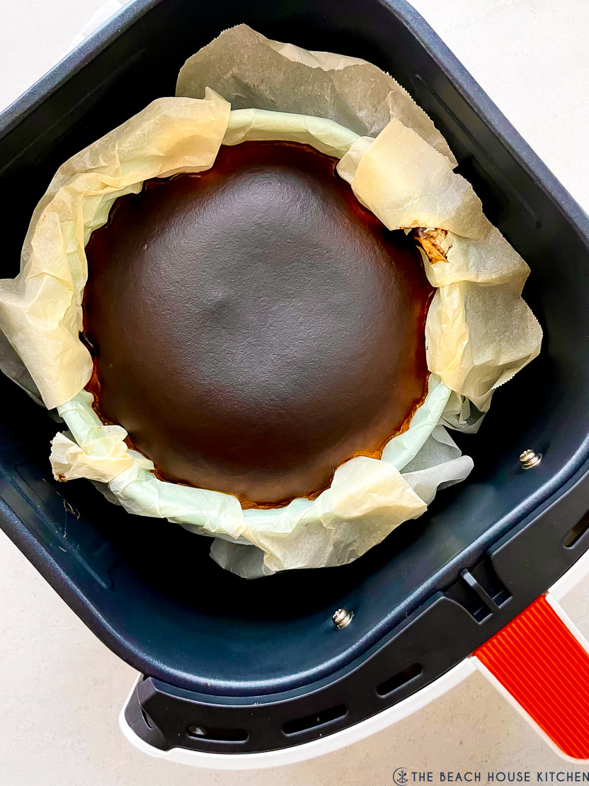 Overhead photo of a Basque cheesecake in an air fryer