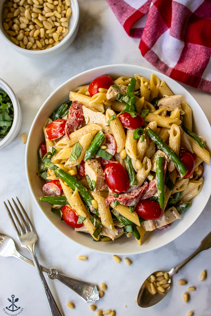 Up close overhead photo of a chicken pesto pasta salad