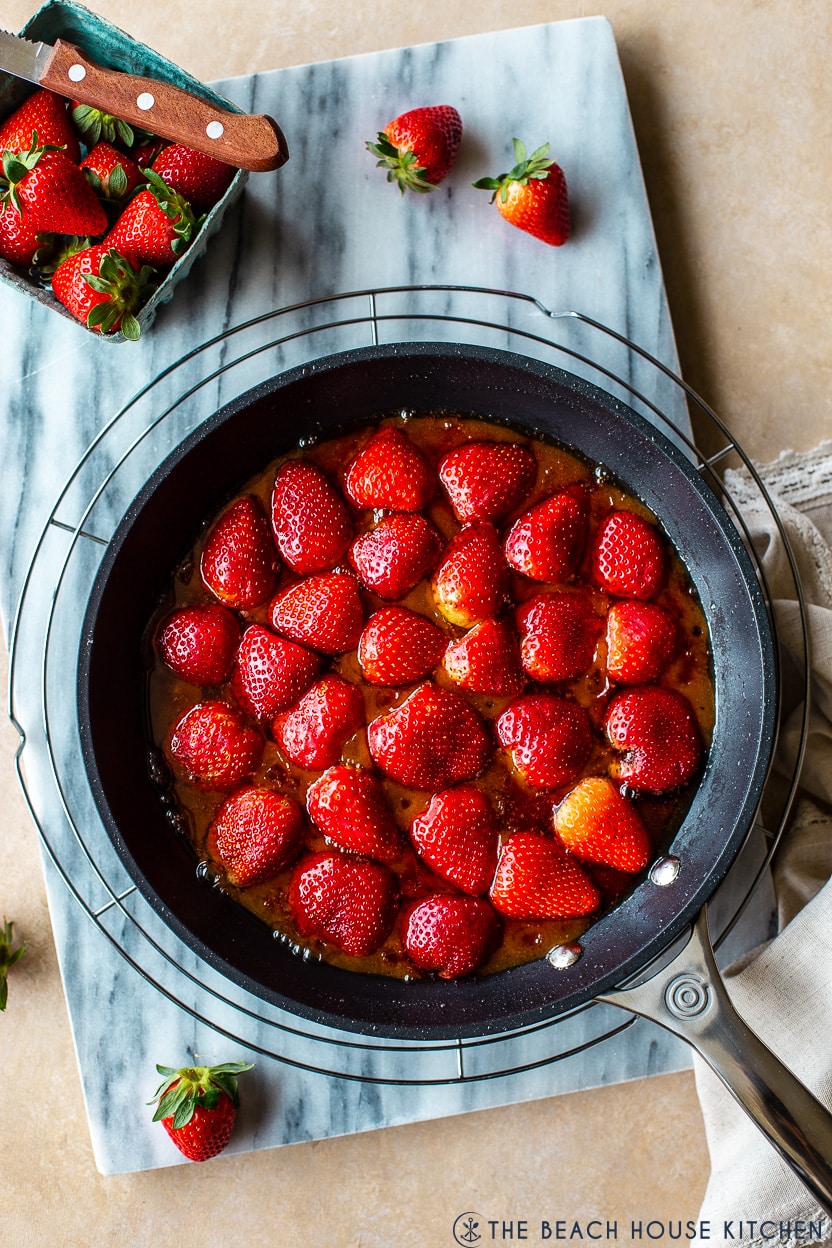 Overhead photo of a skillet of strawberries