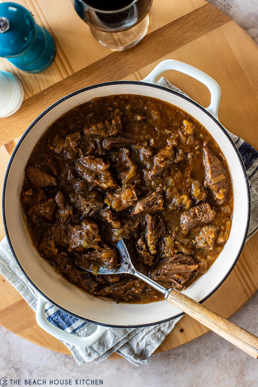Overhead photo of a Dutch oven filled with a French Onion pot roast
