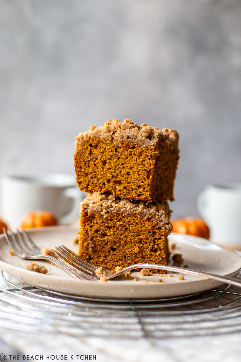 A stack of two pieces of pumpkin crumb snack cake