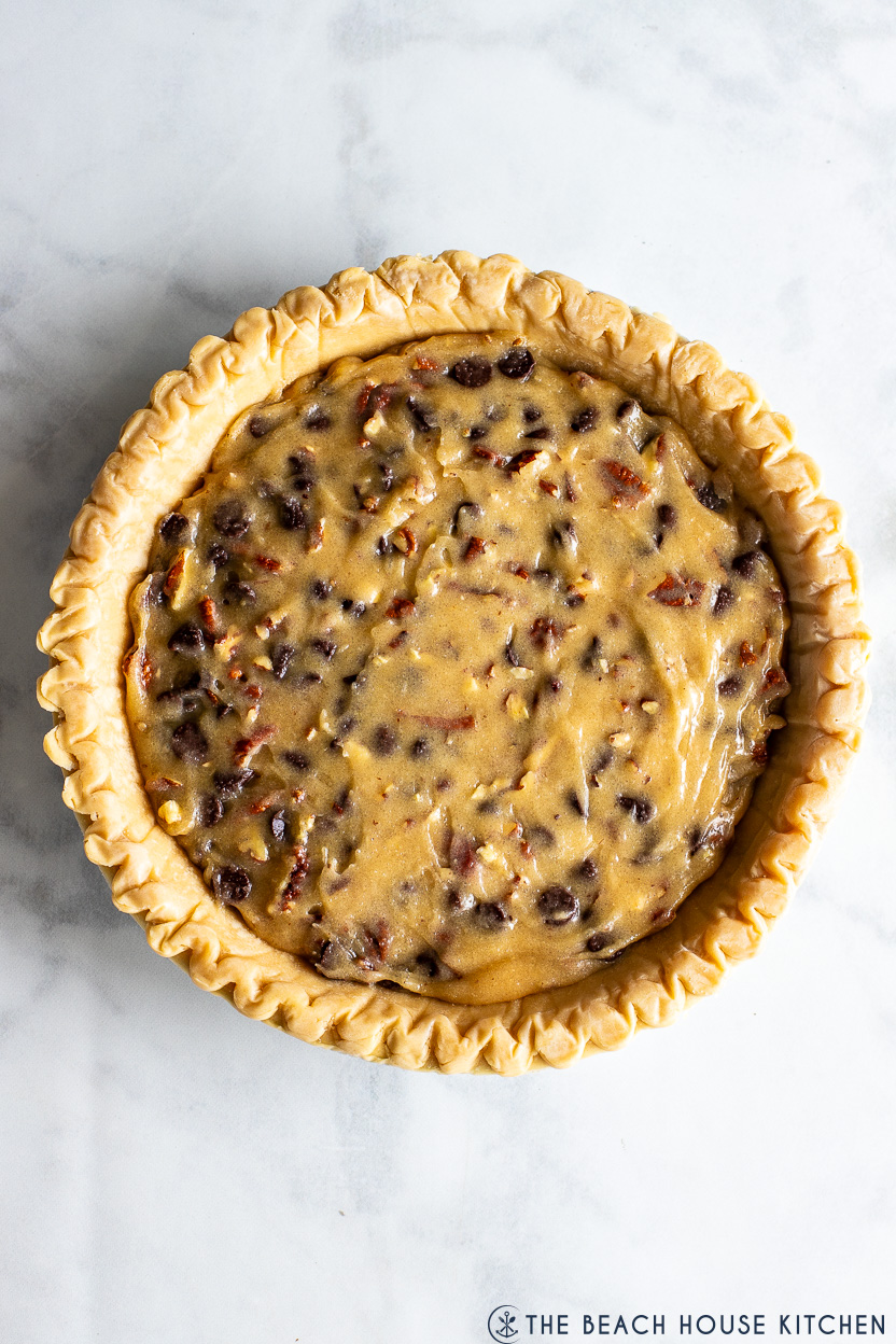 Overhead photo of a pre-baked easy chocolate chip pie