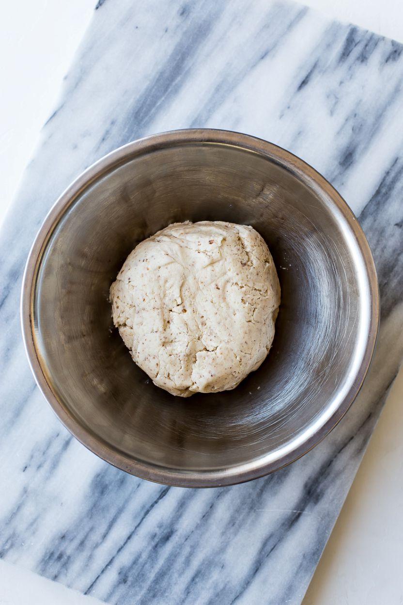 Overhead photo of a ball of almond meltaway cookie dough