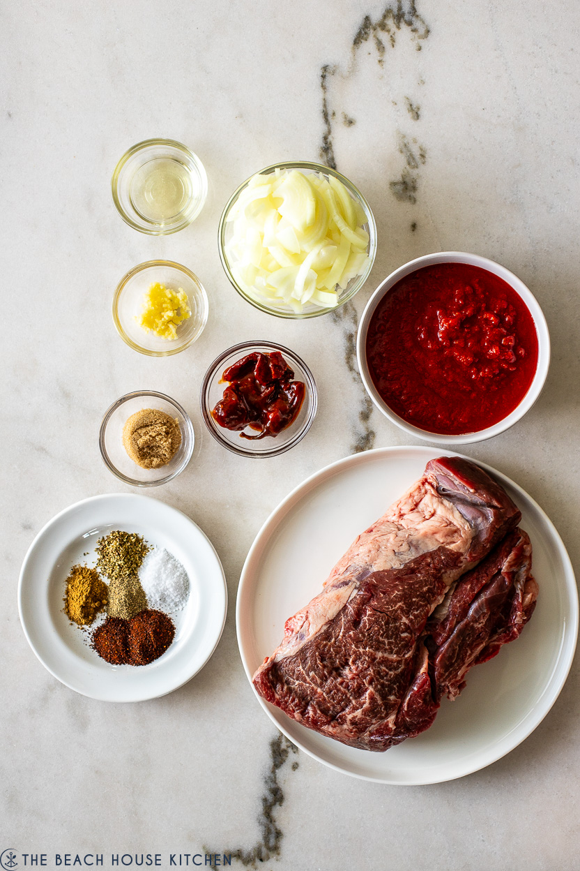 Overhead photo of ingredients for slow cooker beef tinga