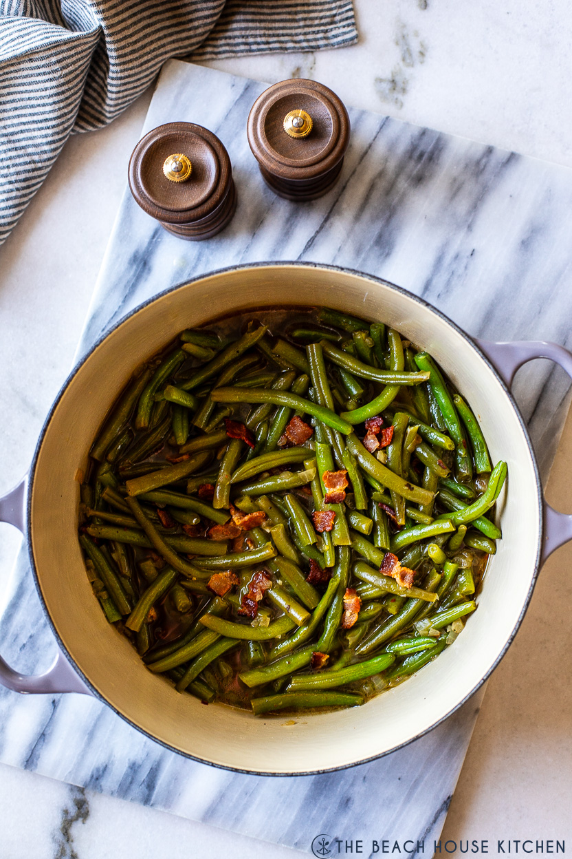 Up close overhead photo of a Dutch oven of Southern-Style Green Beans