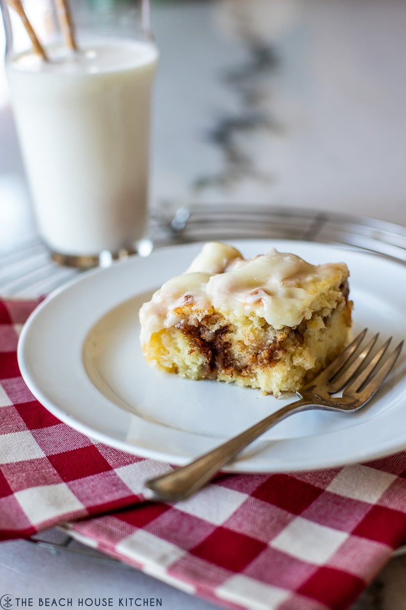 Up close photo of a slice of a cinnamon swirl butter swim biscuit