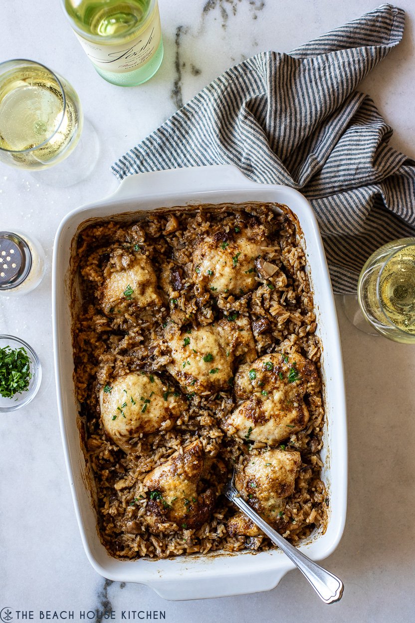 Overhead photo of a baking dish of stick of butter chicken and rice