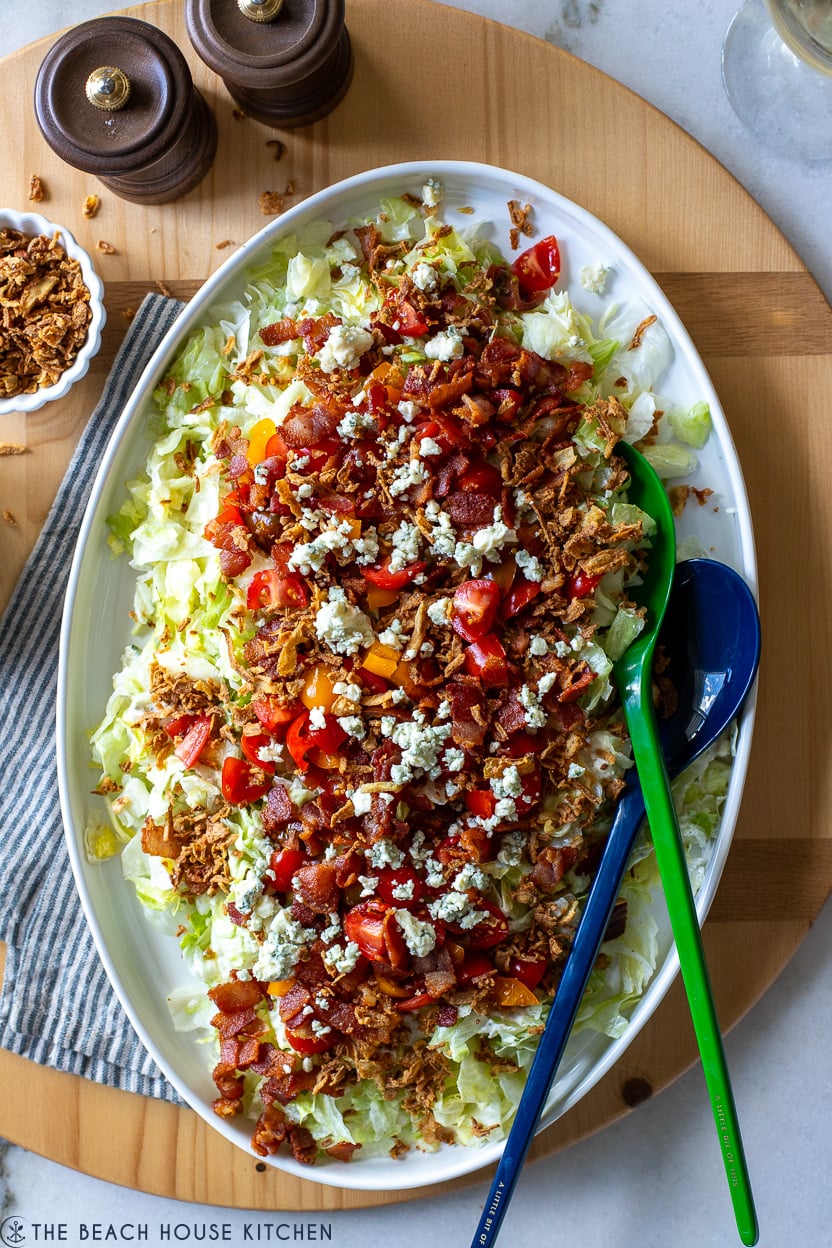 Overhead photo of the best chopped wedge salad on an oval platter