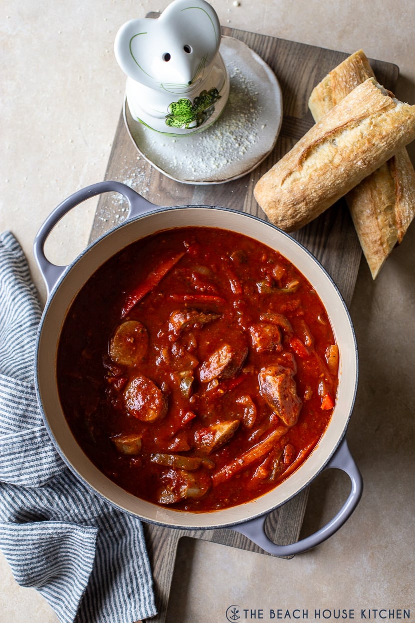 Overhead photo of a pot of Italian sausage peppers and onions