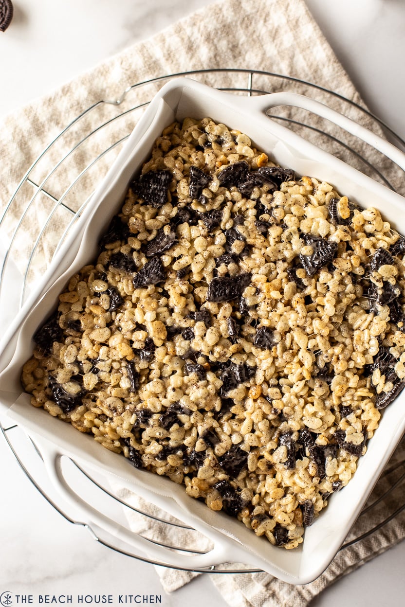 Overhead photo of a white square baking dish of Oreo rice krispie treats
