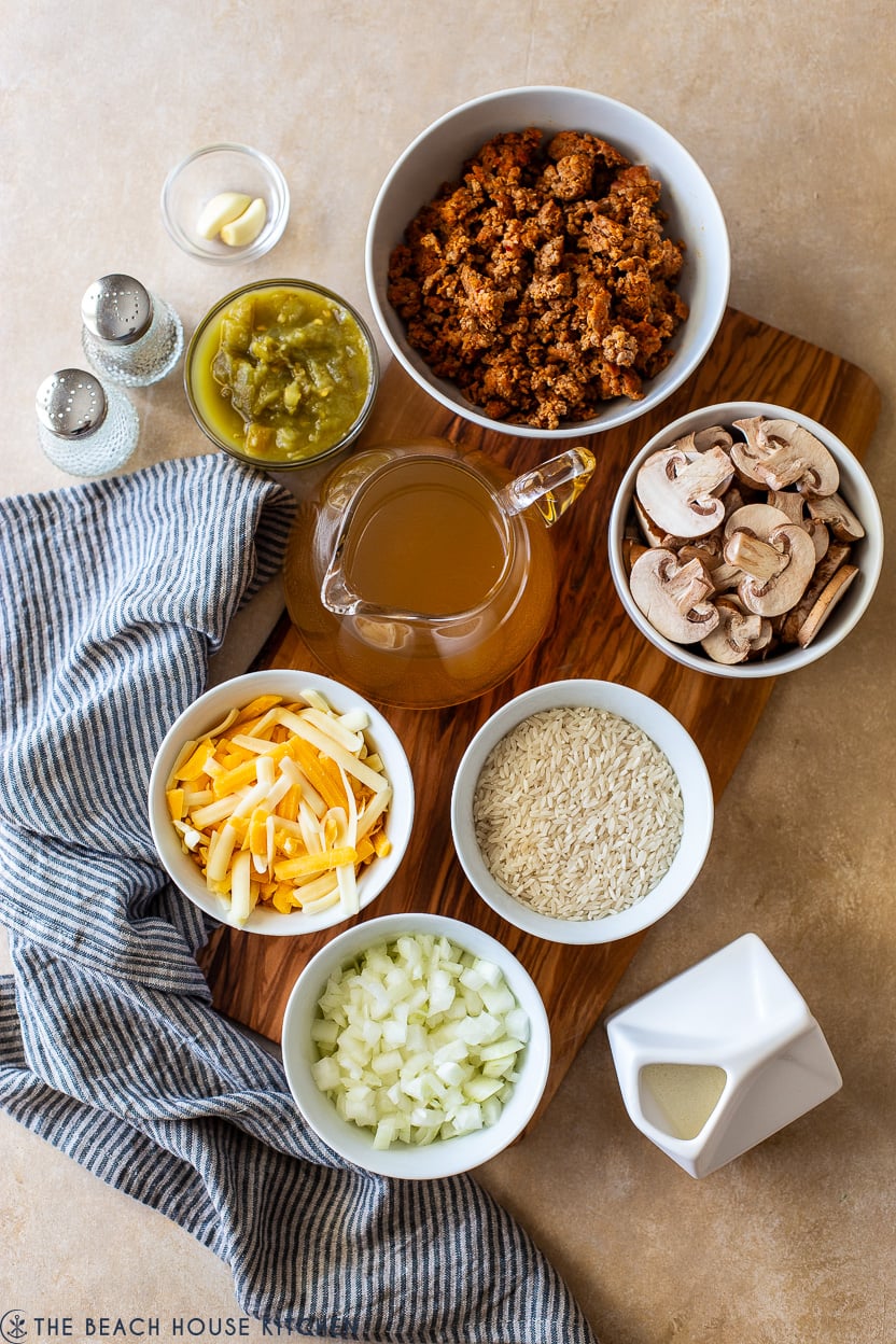 Overhead photo of ingredients for cheesy spicy sausage rice bake