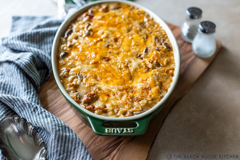 Photo of an oval cheesy sausage rice dish