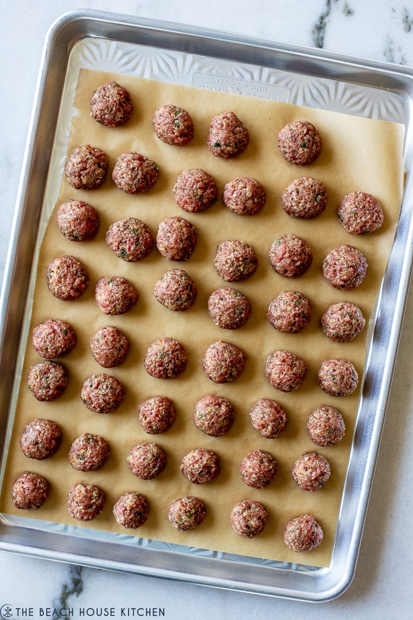 Overhead photo of a tray of mini pre-cooked meatballs