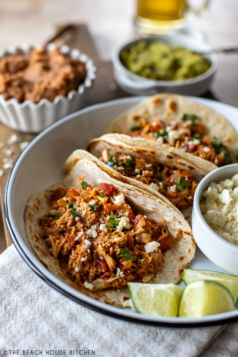 Up close photo of a plate of chicken tacos
