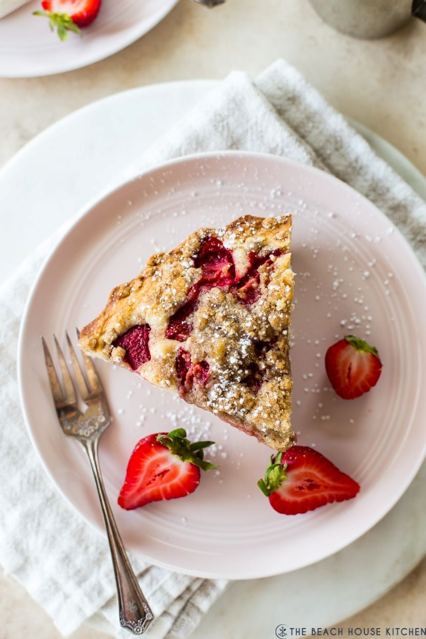 Up close overhead photo of a slice of strawberry buckle