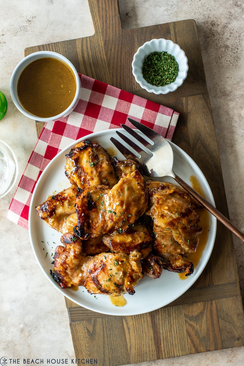 Overhead photo of a plat of grilled honey dijon chicken thighs