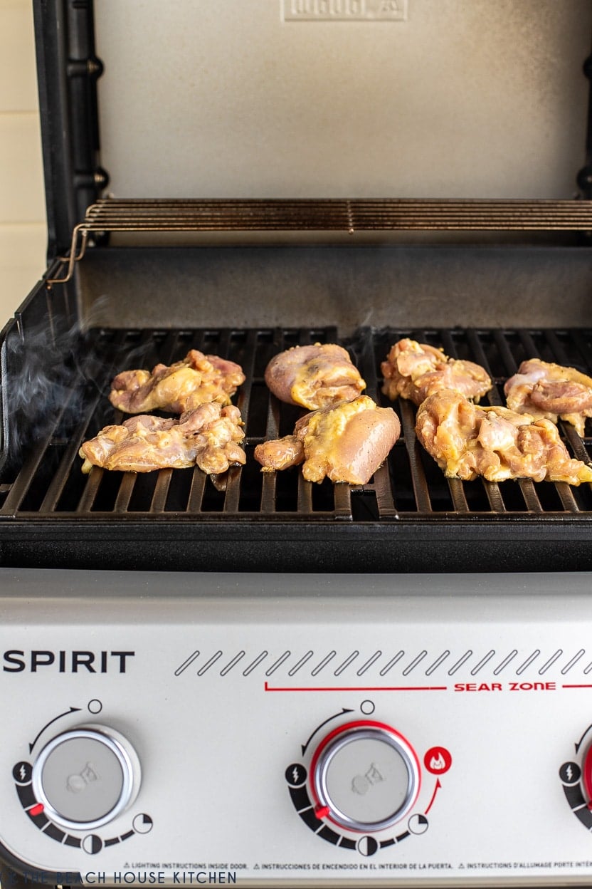 Chicken thighs on a grill