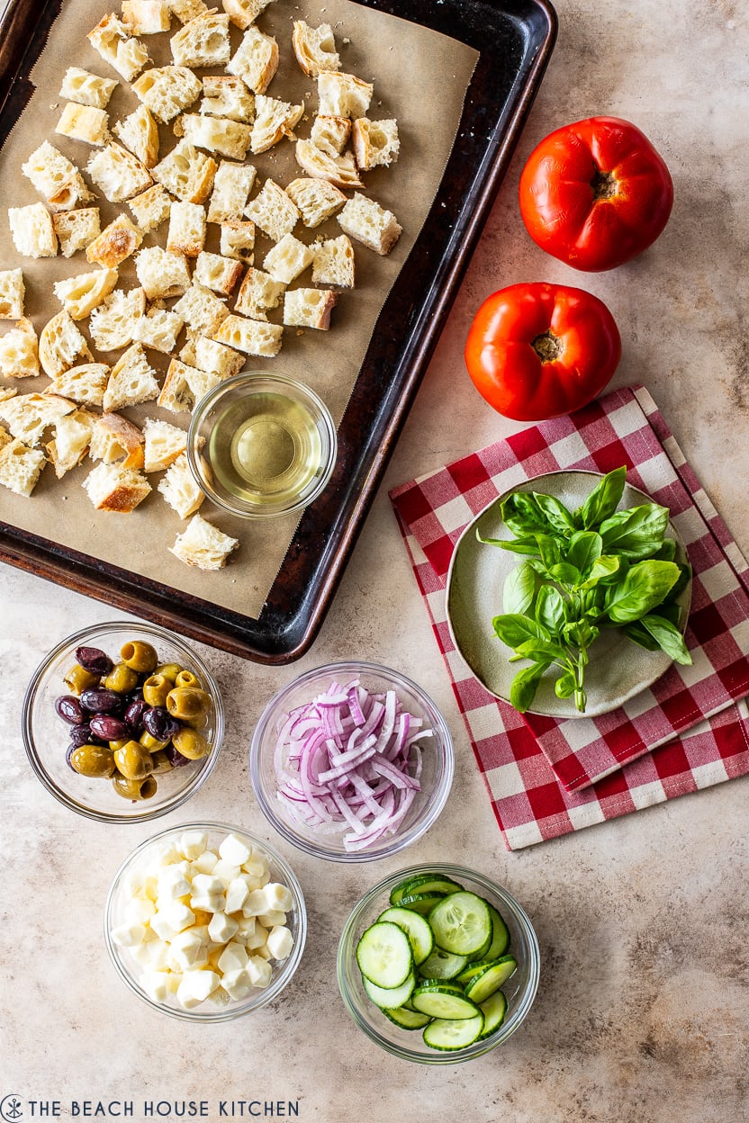 Overhead photo of ingredients for a panzanella salad