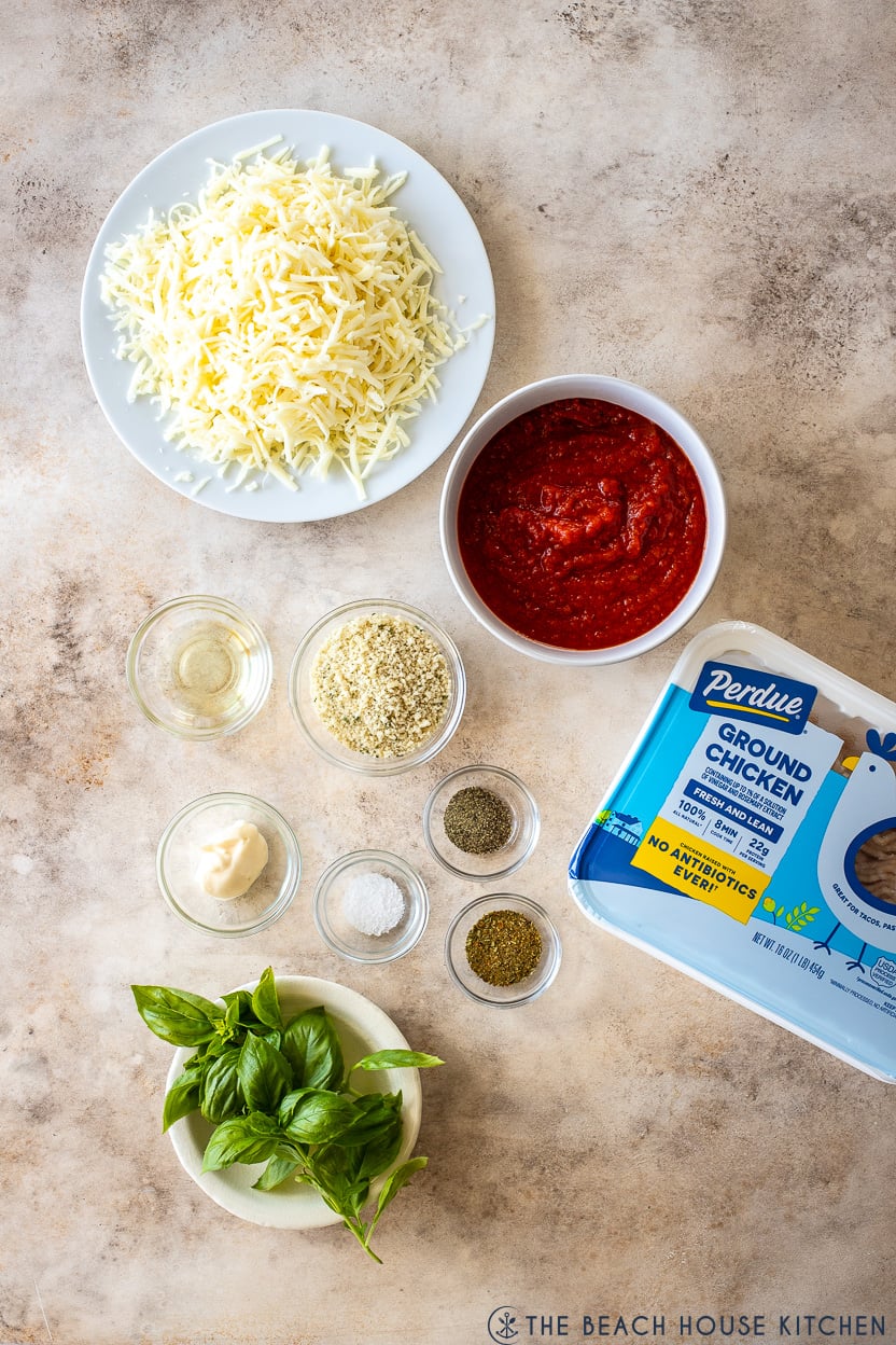 Overhead photo of ingredients for chicken pizza burgers