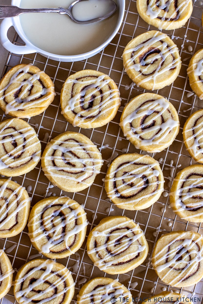 Overhead photo of cinnamon roll cookies on a wire rack