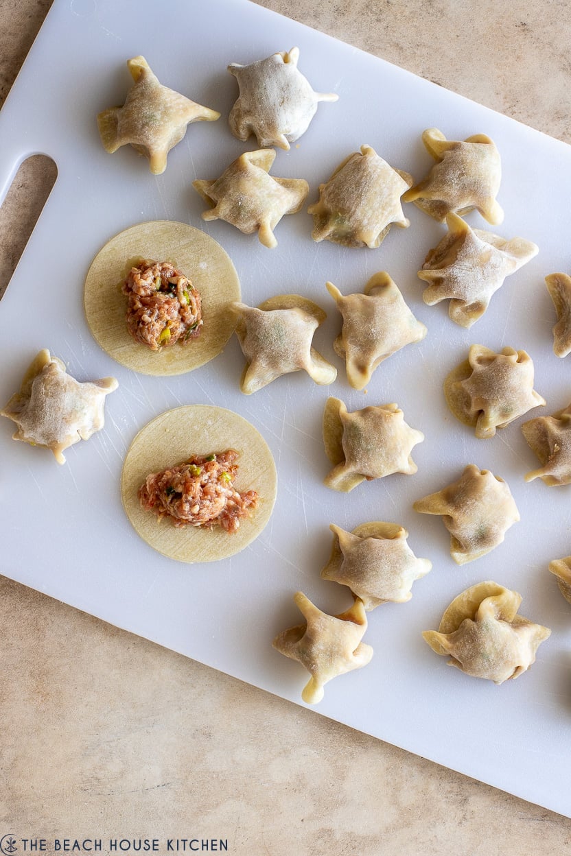 Ovhead photo of pre-cooked viral blanket dumplings